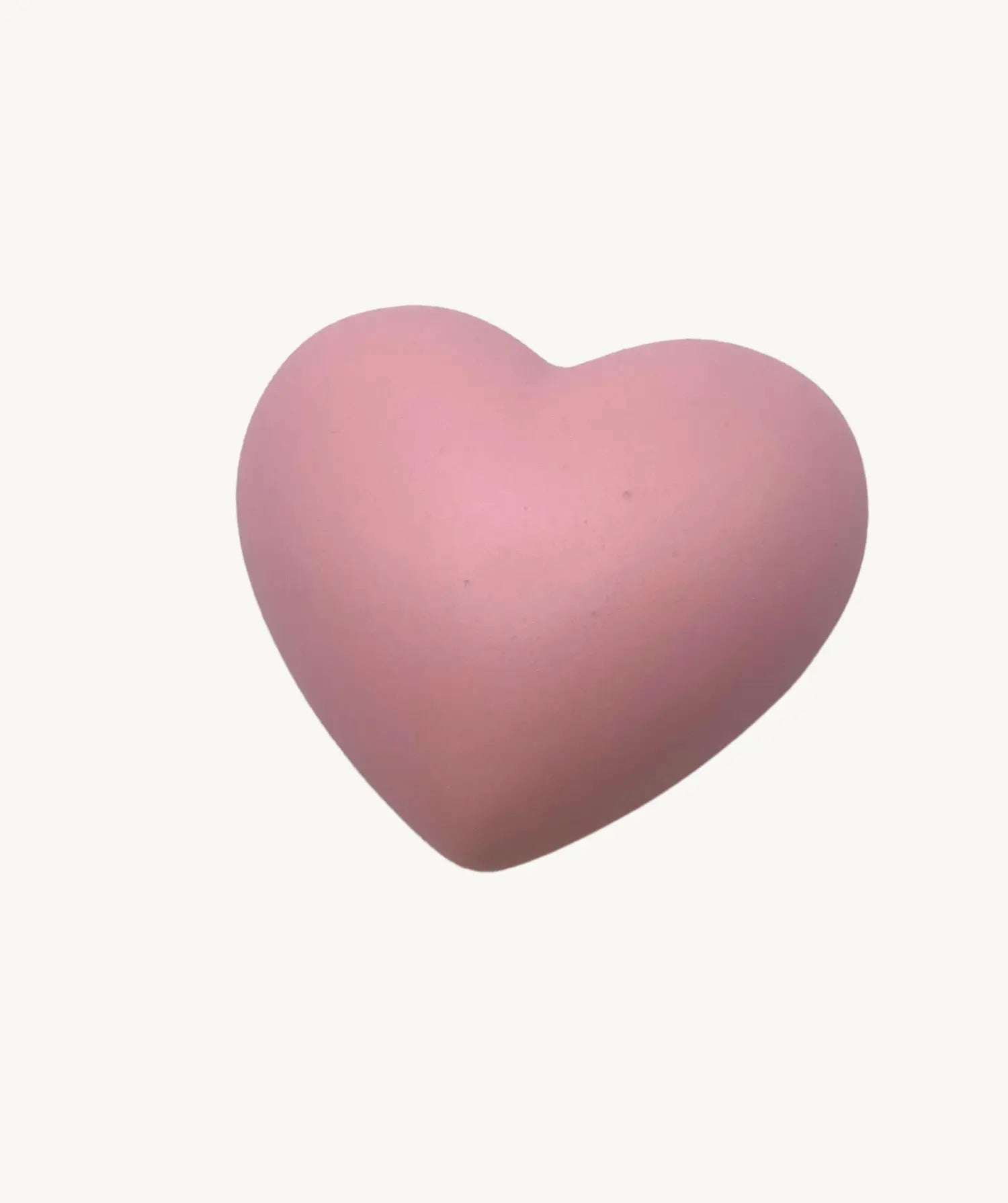 Rosa Handschmeichler in Herzflorm mit glatter Oberfläche